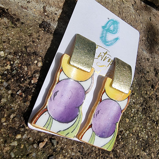 Aros de porcelana con diseño frutal.