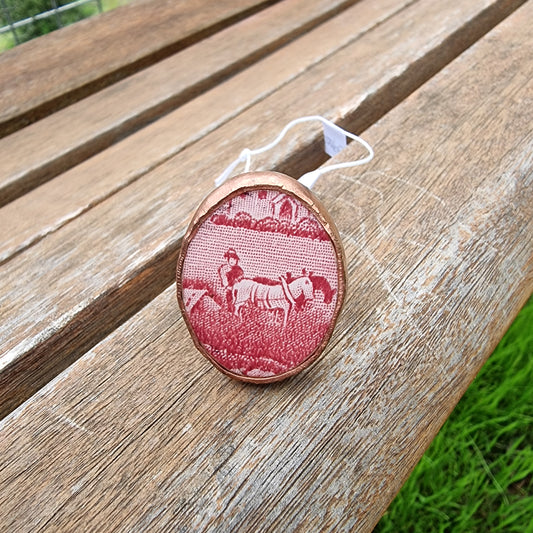 Anillo ovalado, con diseño campestre